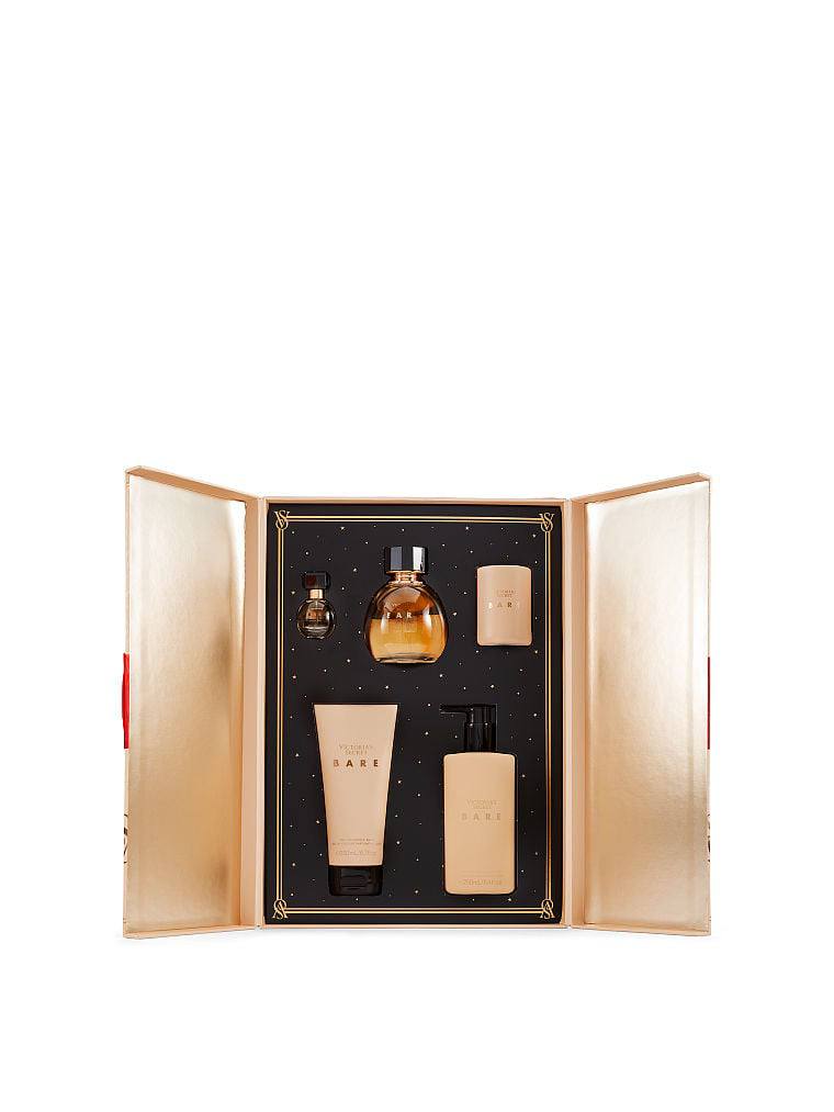 Victoria's Secret Bare (ویکتوریا سکرت بِر) — عطر و لوسیون کنار شمع عطری — دارامُد