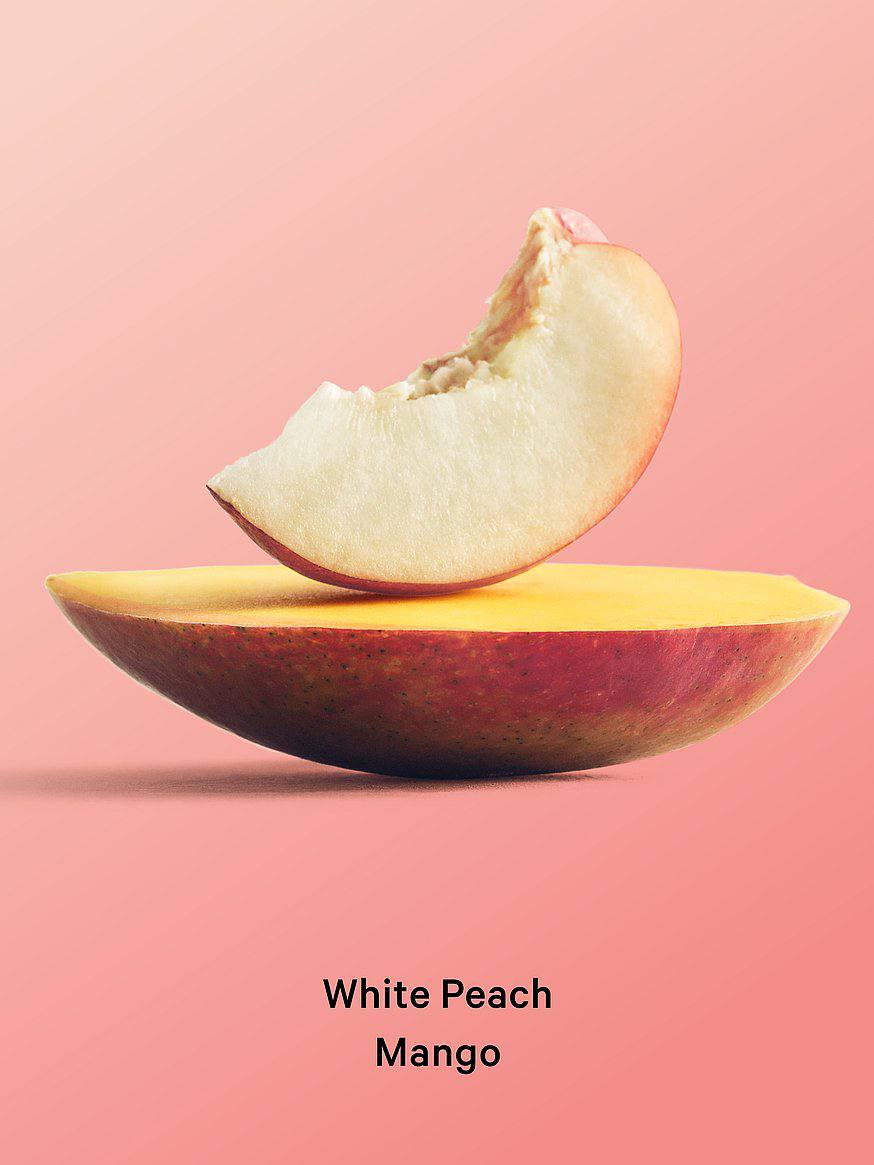 ویکتوریا سکرت روغن هایلایتر White Peach Mango، نمای نزدیک بافت اکلیلی — دارامُد